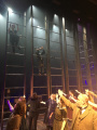 Hand loops being reset by crew during a curtain call rehearsal.