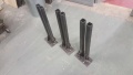 Freshly welded drop divert pulley mounts for below grid.