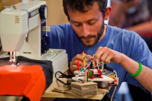 Roy working with electronics at Culture Hack Scotland 2013