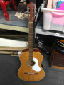 Light brown acoustic guitar