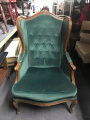 Dark green velvet armchair