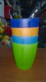 There are five assorted coloured tumblers like these,