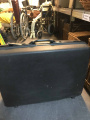 Large navy suitcase