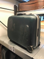 Small black hard suitcase