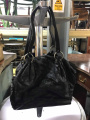 Tatty black handbag