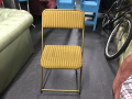 Yellow fold out chair